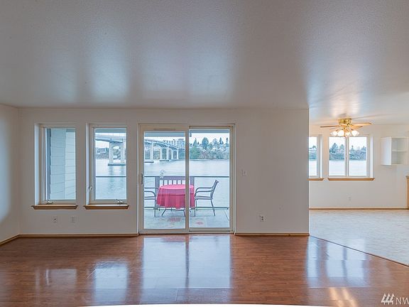 Can you imagine living in this wonderful space, glowing with natural light?  Manette Bridge in backdrop.