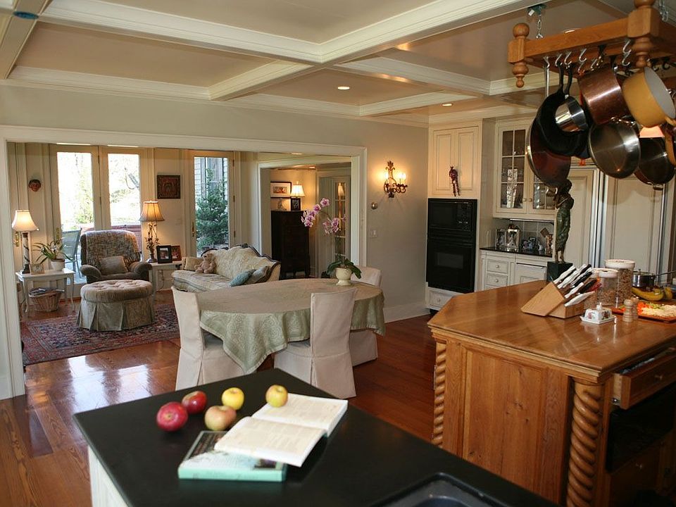 chef's kitchen leading to family room