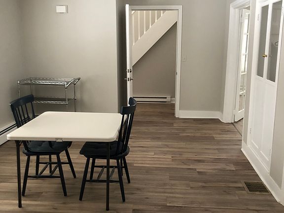 The dining room looking toward the entry...straight ahead and showing a glimpse of the closet in the dining room and the French Doors into the Living Room.