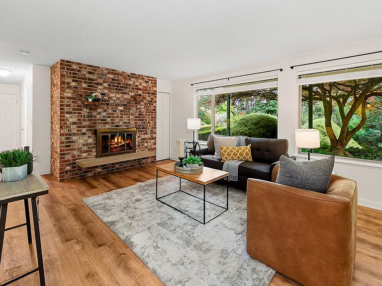 A brick fireplace adds to the ambiance.