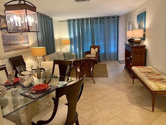 Living/dining area.
Some furnishings may be available throughout the house.