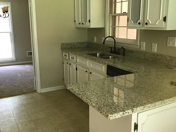 beautiful kitchen with brand new stainless steel appliances