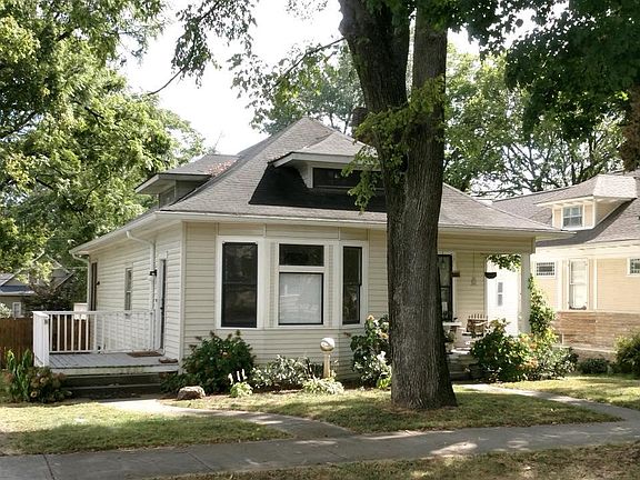Entrance to apartment is from the side porch, next to the driveway.