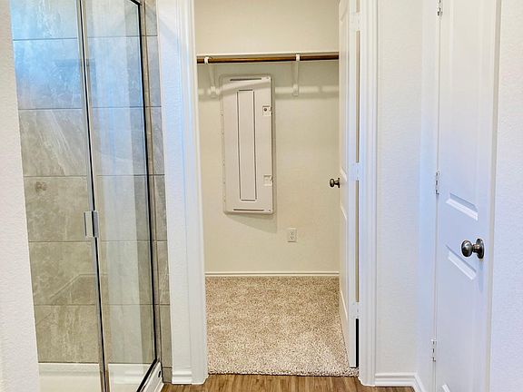 Large closet with smart home technology hub
