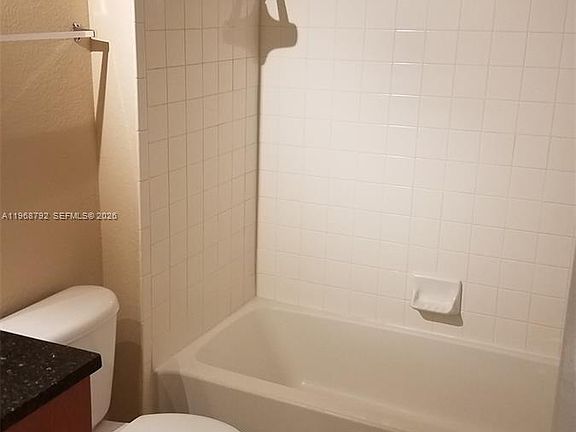 5th image of 3450 Pinewalk Dr N APT 418