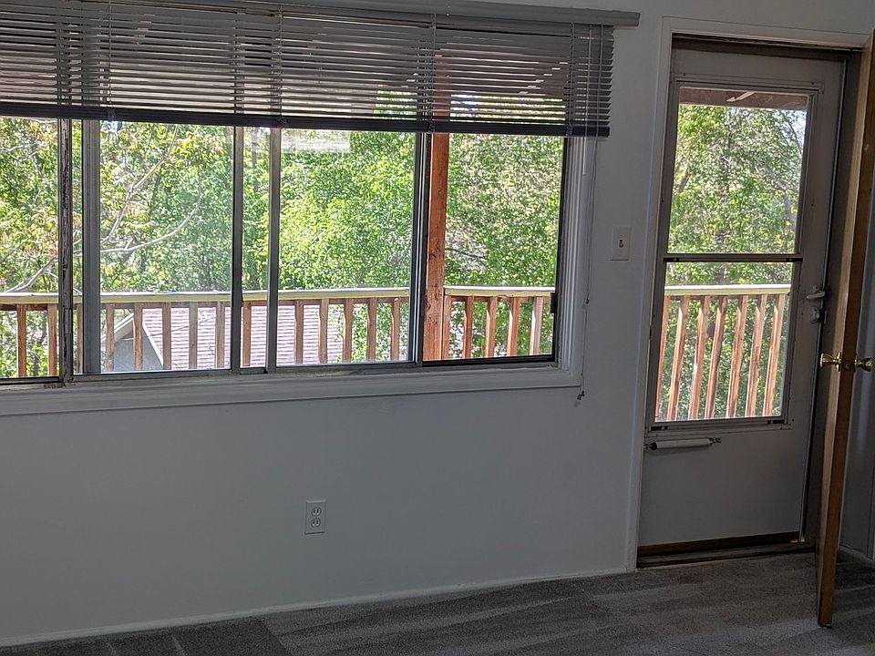 Living room with access to deck