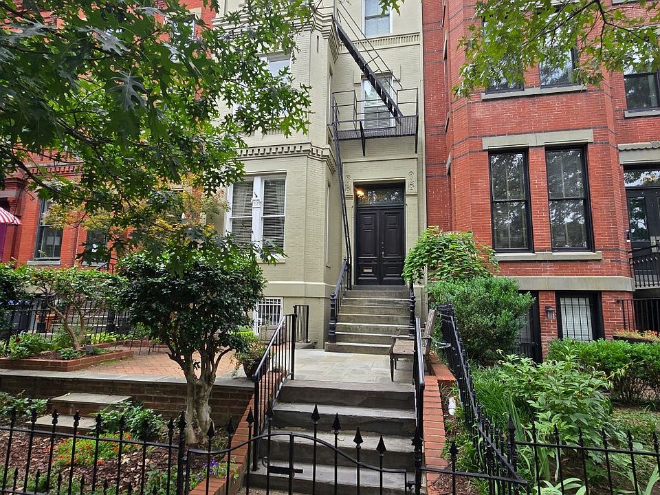 Front garden with basement windows to the left of the steps