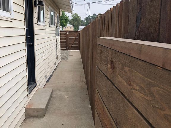 side yard off kitchen - security gates lock at both ends + p