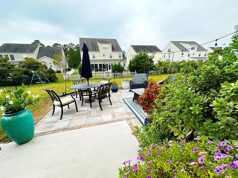 Lovely outdoor space with extended patio and pavers
