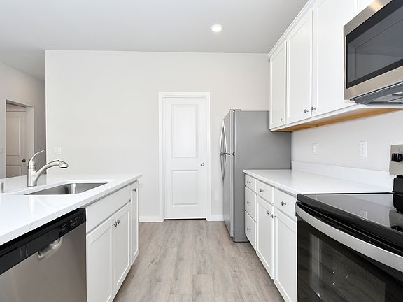 Each kitchen comes with stainless steel appliances included.