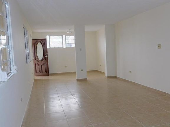 FOYER OF UNIT ON 1ST FLOOR