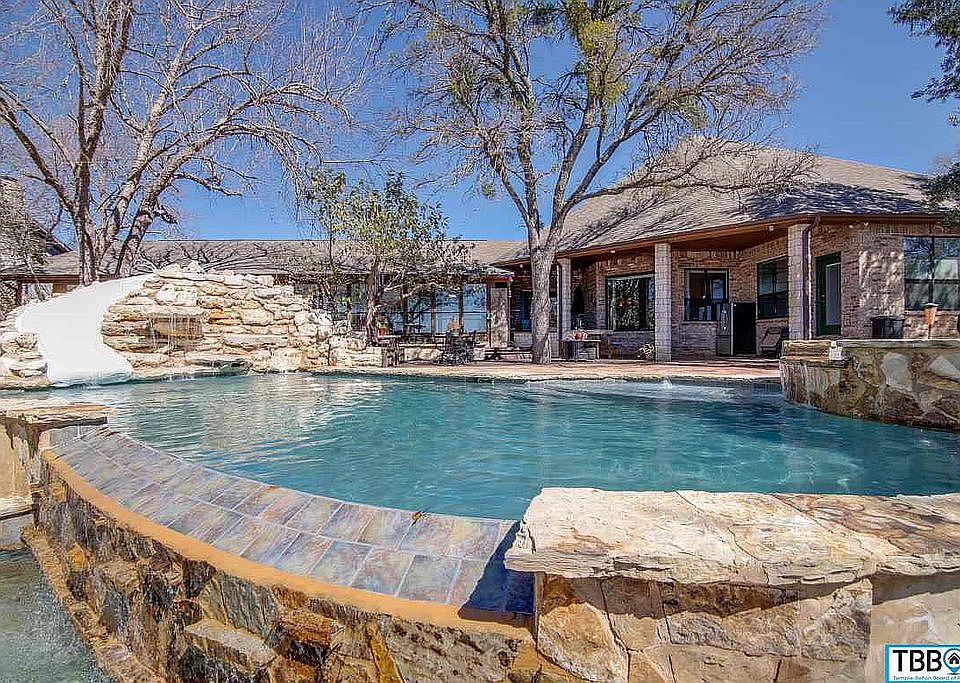 Custom pool, waterfall, hot tub