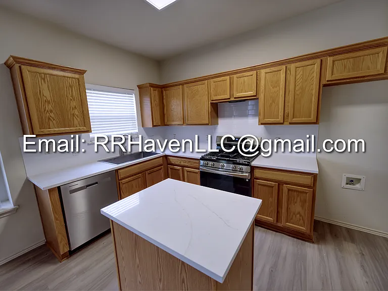 Kitchen 
Refrigerator is included