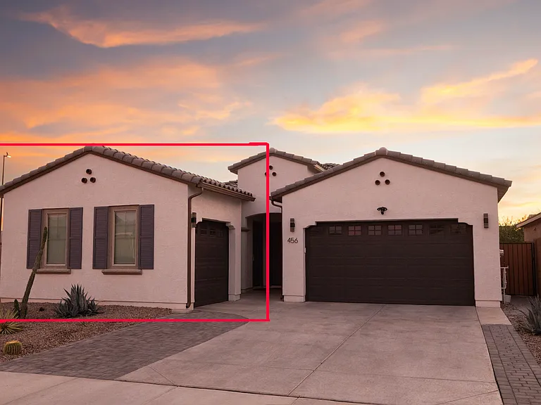 The left side (street facing) is the vacant property entrance and garage.