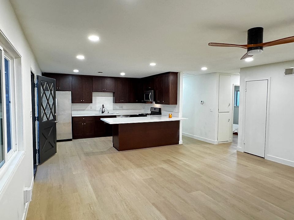 Kitchen opens up into the living room