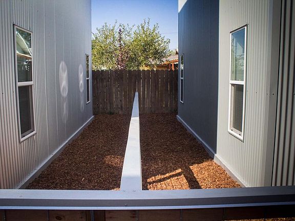 Small private fenced areas between each home