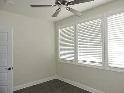 The master bedroom is spacious.