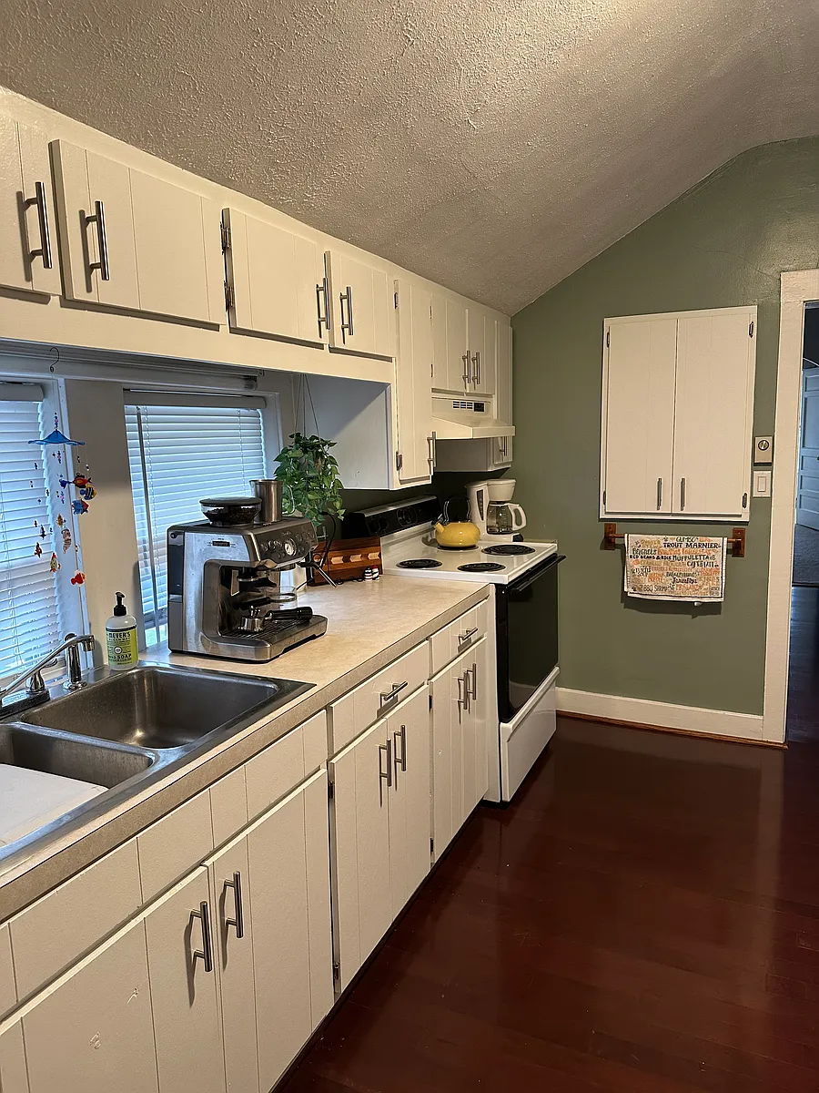 Lots of cabinets including spice cabinet. - 712 Elm St