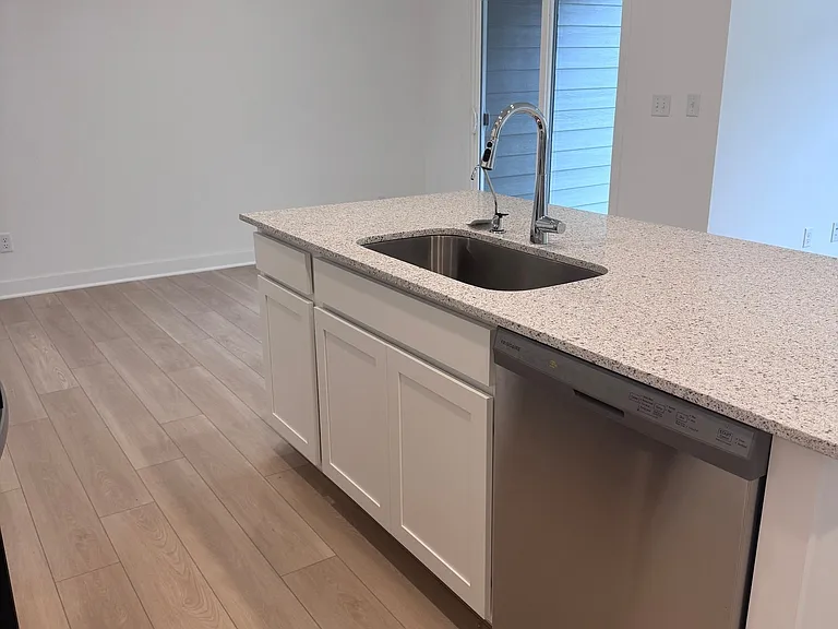 Kitchen (angle 1)
Open-concept kitchen with large island and ample counter space