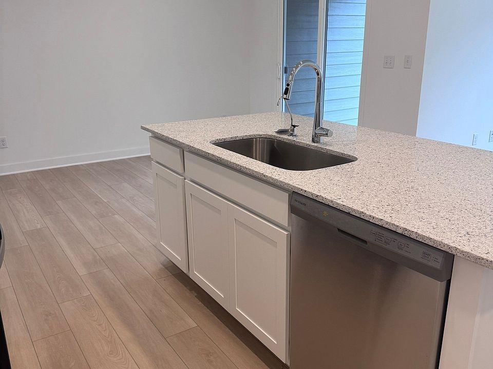 Kitchen (angle 1)

Open-concept kitchen with large island and ample counter space