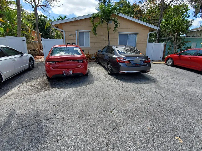 Assigned parking spot on the far left (white car)