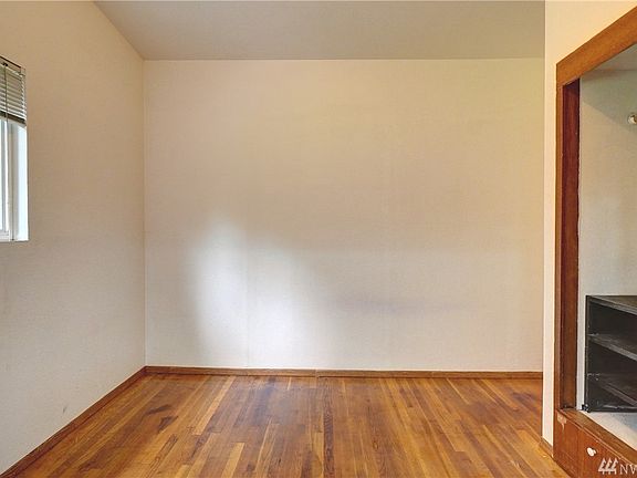 Light and bright bedroom with built-in storage.