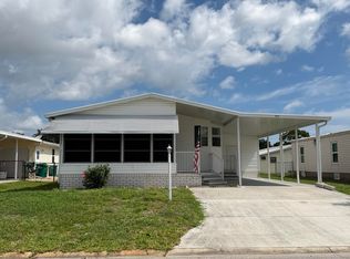 334 Macadamia Dr, Barefoot Bay, FL 32976