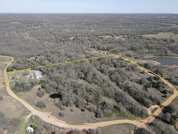 <p>Property line. Looking south east</p>