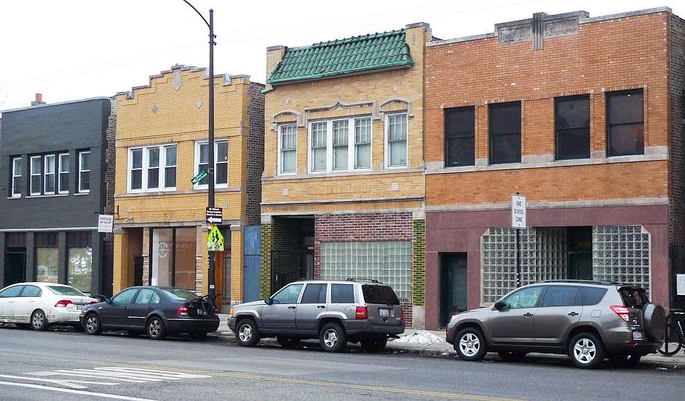 1020 N. Western Ave. 2nd Fl. Apt.; situated above glass block storefront; far right photo.