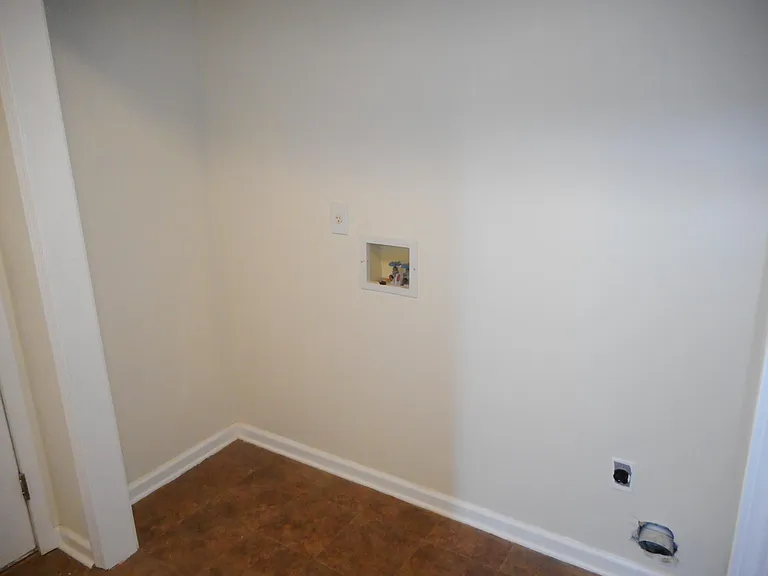 Plumbed laundry room on the lower level.