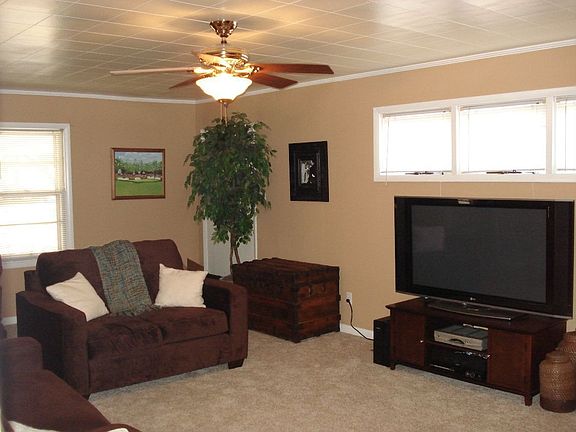 Huge living room with crown and updated carpet