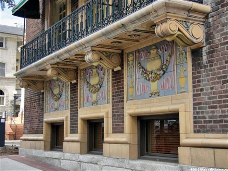 Ceramic tile detailing on front of bldg.