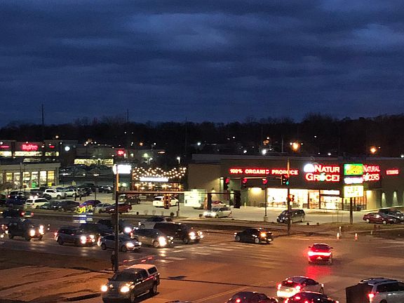 Night view of intersection of Gilbert & Hwy 6
