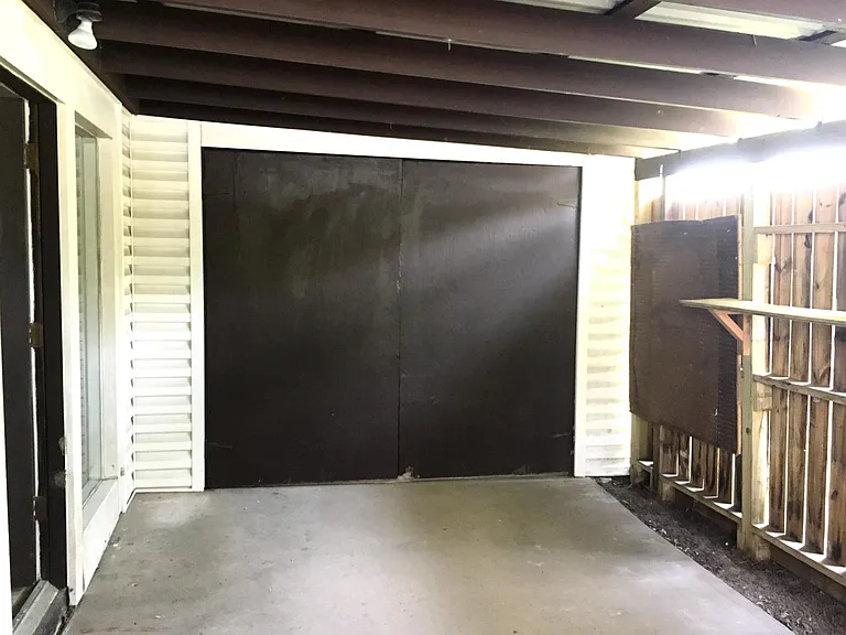 Carport area with home access.
