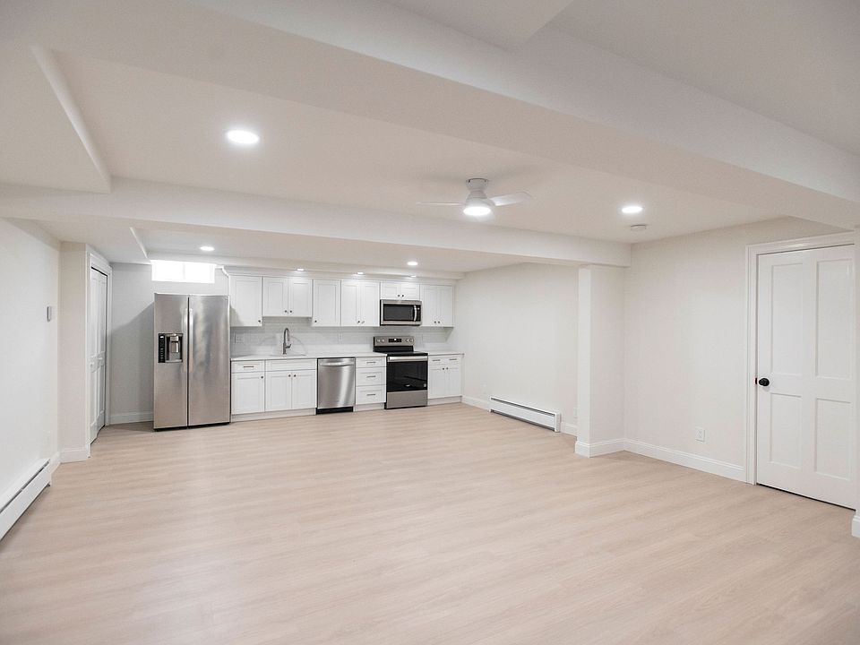 LARGE open concept, well thought out warm LED lighting plan with tons of natural light.
