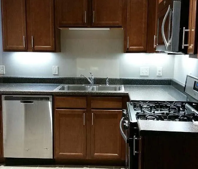 New birch cabinets, tiled kitchen