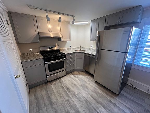 Gas cooking, dishwasher, garbage disposal and refrigerator.