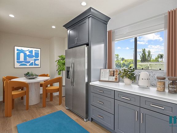 Kitchen with Stainless-Steel Appliances and Dining Area