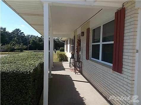 Covered front porch adds to the natural curb appeal of this home.