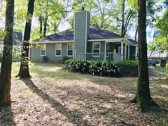 Large fenced backyard.