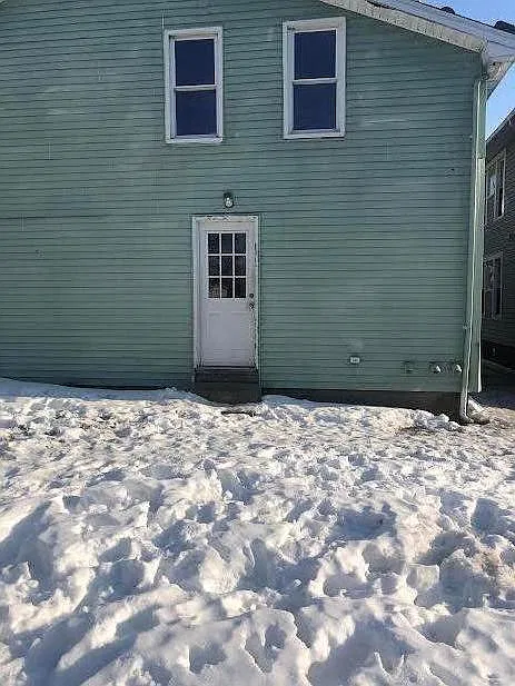 Entry from back yard/parking area