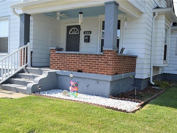 Nice covered front porch for sitting with morning coffee.