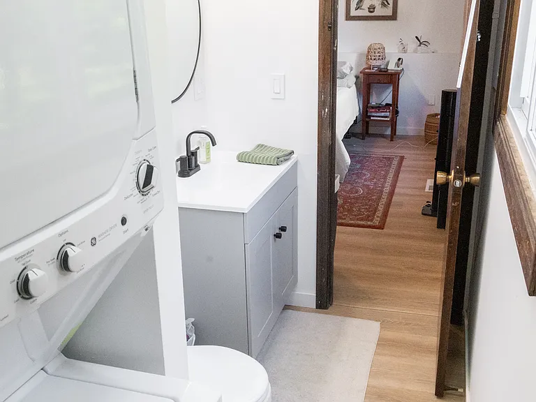 Remodeled half bath with in-unit laundry