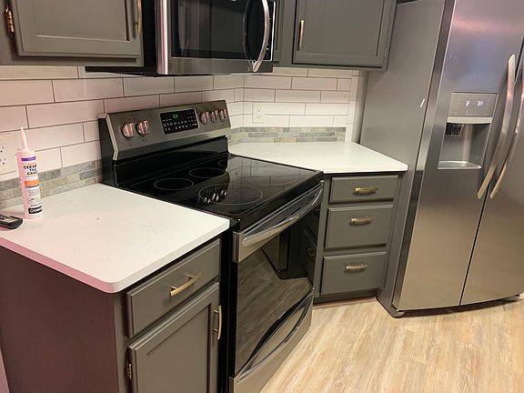 New kitchen, beautiful tile and Quartz counters, matching appliances