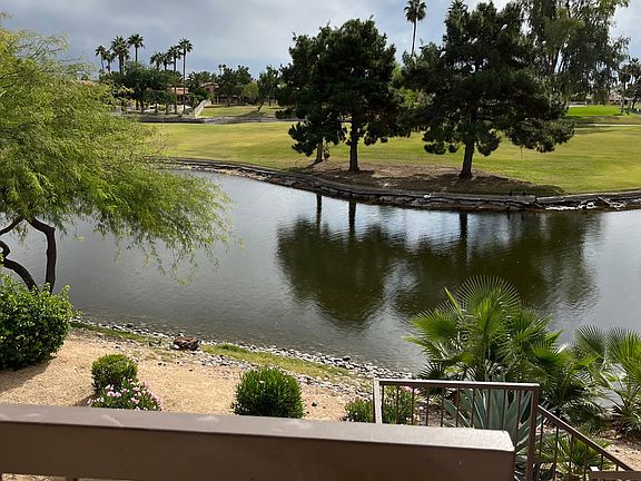 view from front patio of the lake and golf course