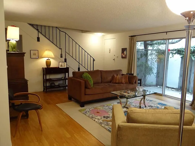 Living room w/patio (other unit furnished with same floor plan)