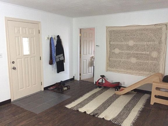 Living Room (front door, doorway to front bedroom)