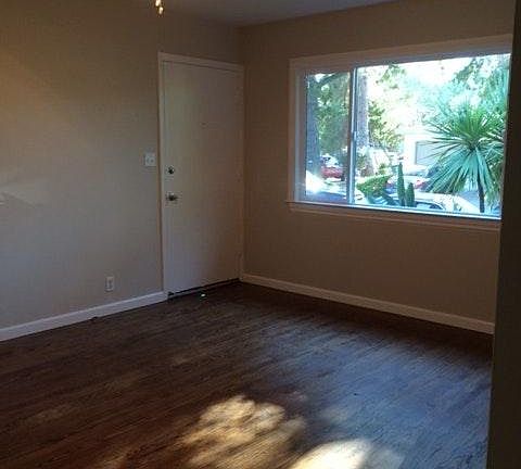 front room w/fan/lg window