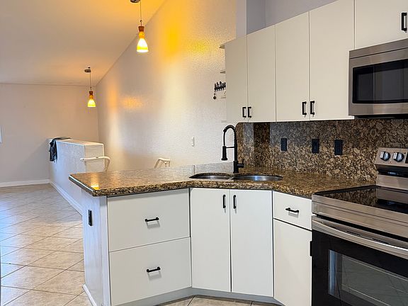 2nd image of 10921 W Okeechobee Rd Unit 202