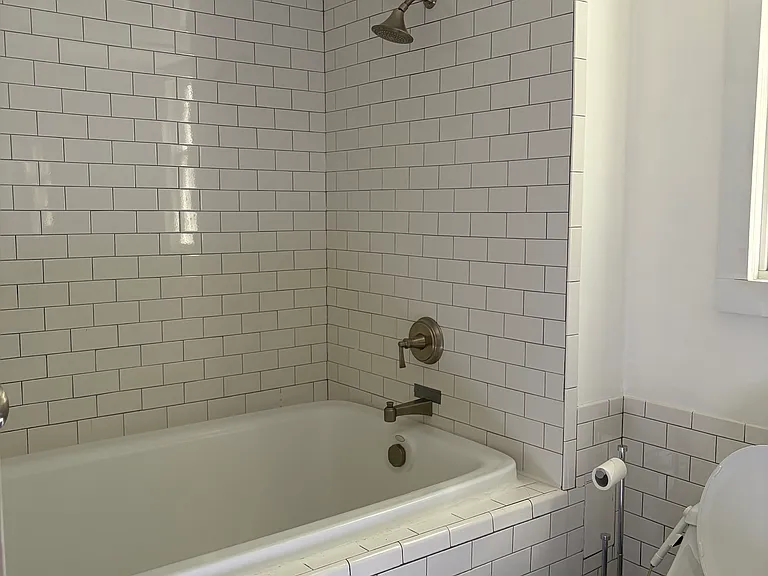 Bathroom with huge bathtub.